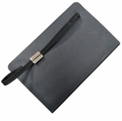 notebook with elastic band and plaque